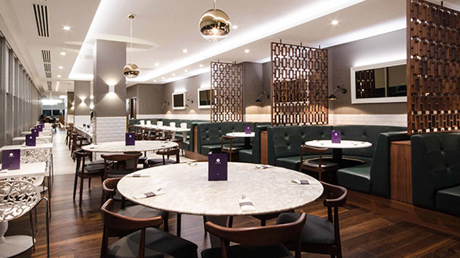 Tables set in stylish No1 Lounge in London Gatwick's North Terminal
