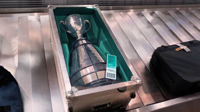 Grey Cup in a suitcase