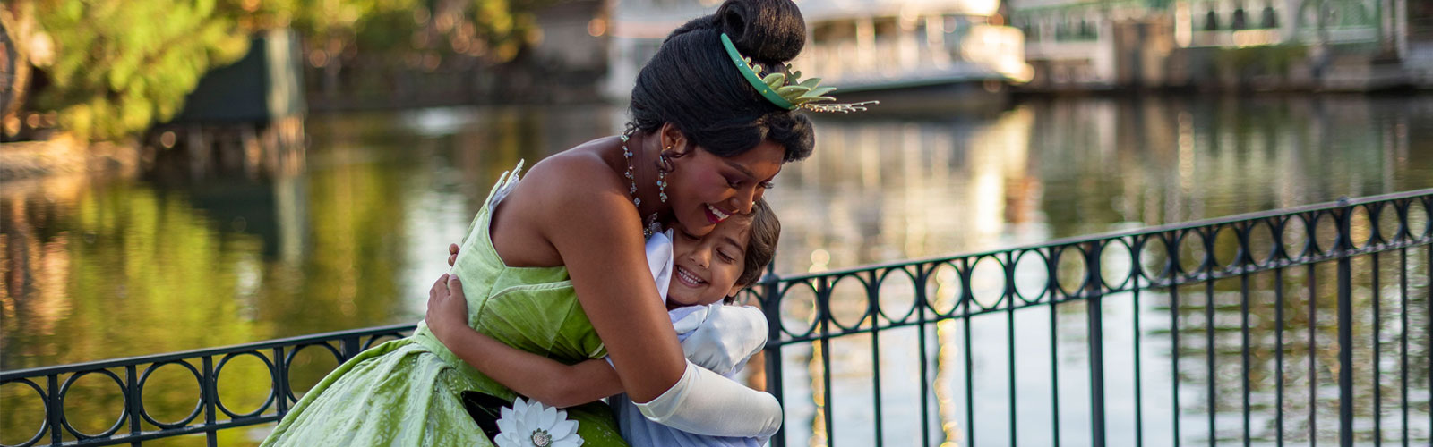 Disneyland Resort Princess Tiana hugging child