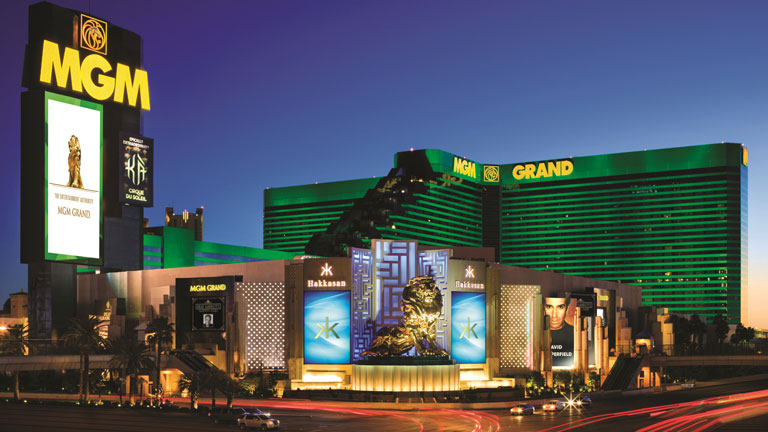 exterior of MGM Grand signs lit up at night