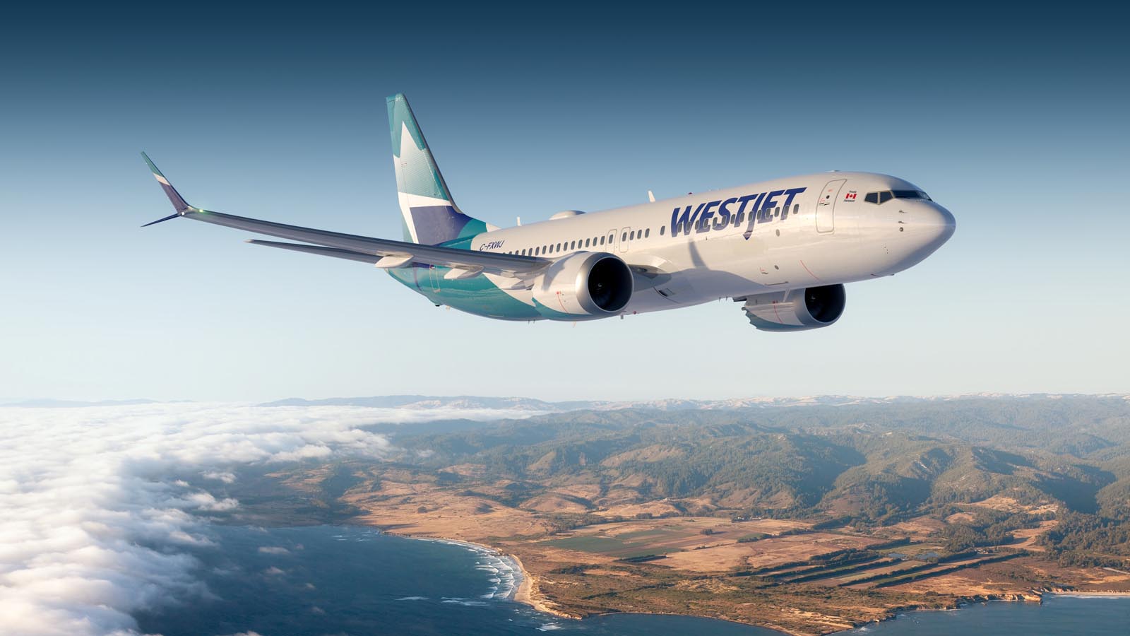 WestJet Boeing 737-8 MAX flying over west coast