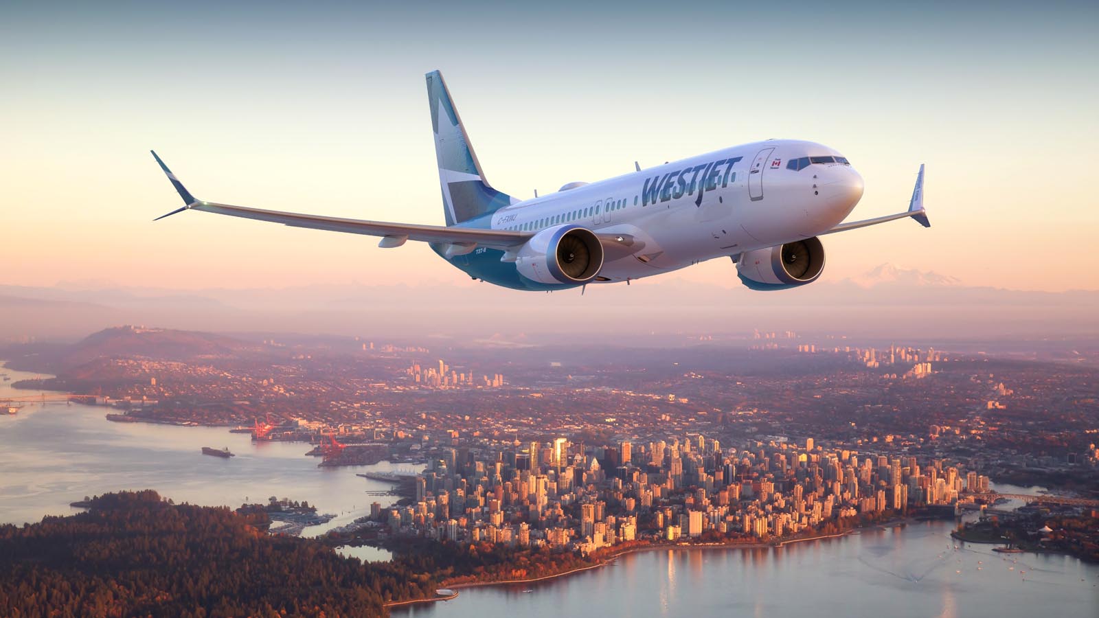 WestJet Boeing 737-8 MAX flying over Vancouver BC