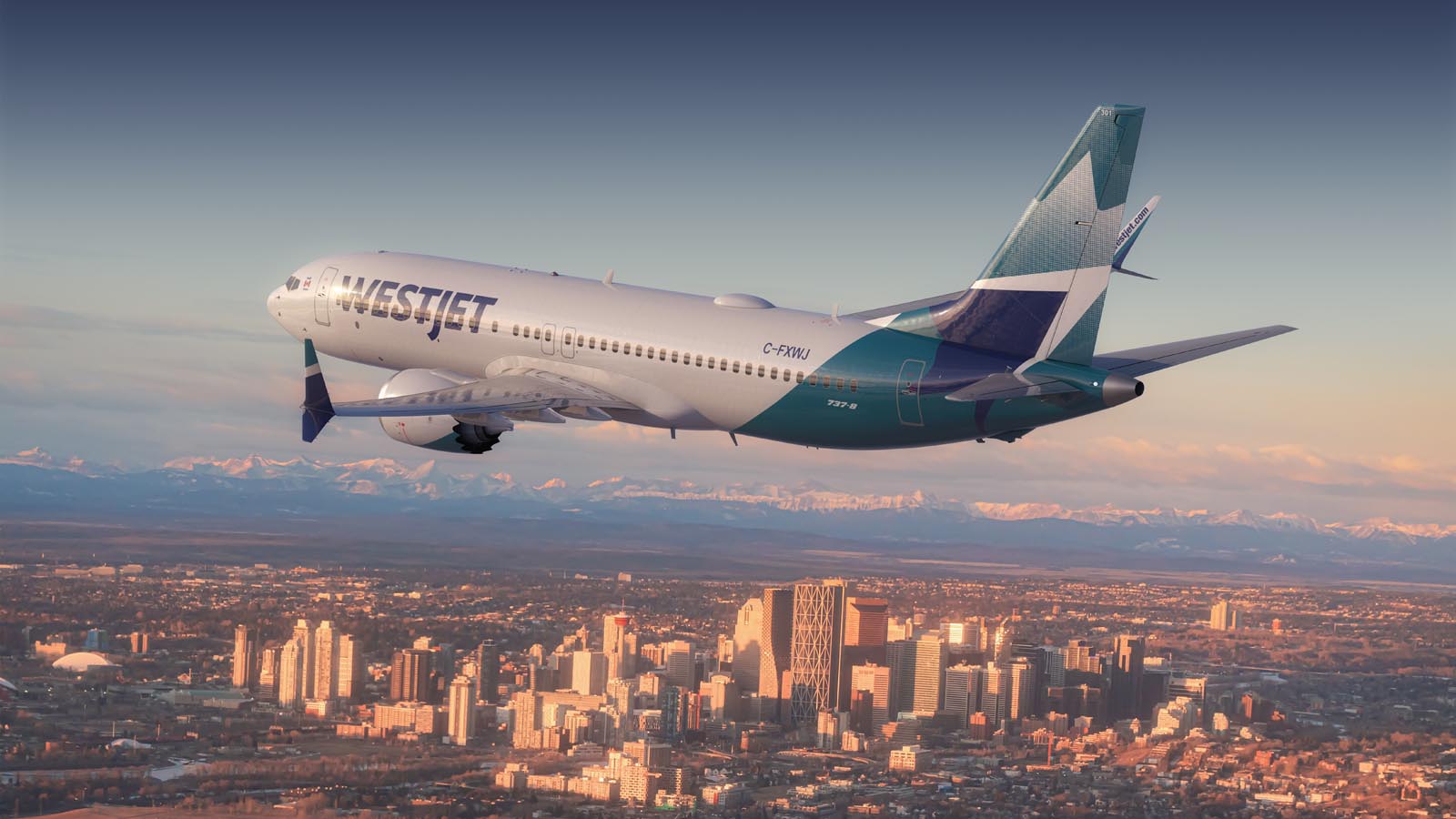 WestJet Boeing 737-8 MAX flying over Calgary Alberta