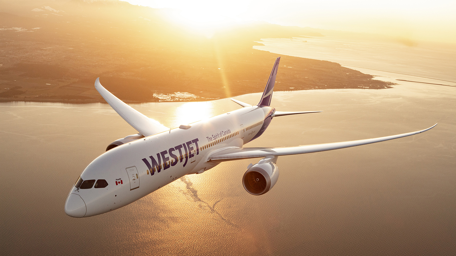 WestJet Boeing 787-9 Dreamliner flying at sunset