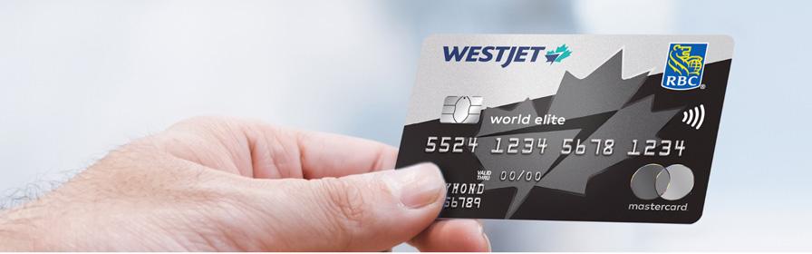 Guest holding a WestJet RBC® World Elite Mastercard‡ 