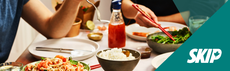 Friends eating Thai food.