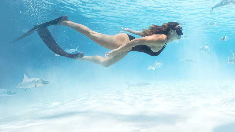 Girl snorkeling in Nassau