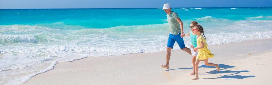 Family on the beach in Cuba